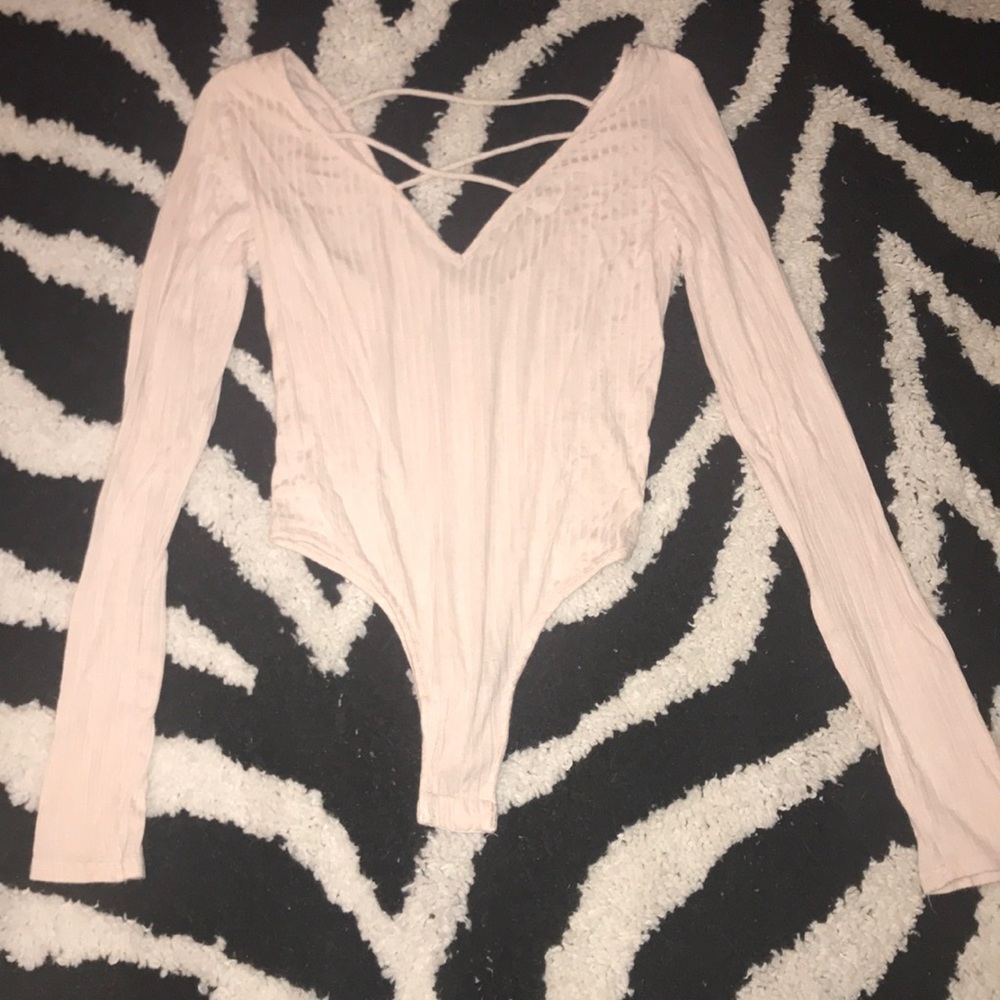 pink body suit